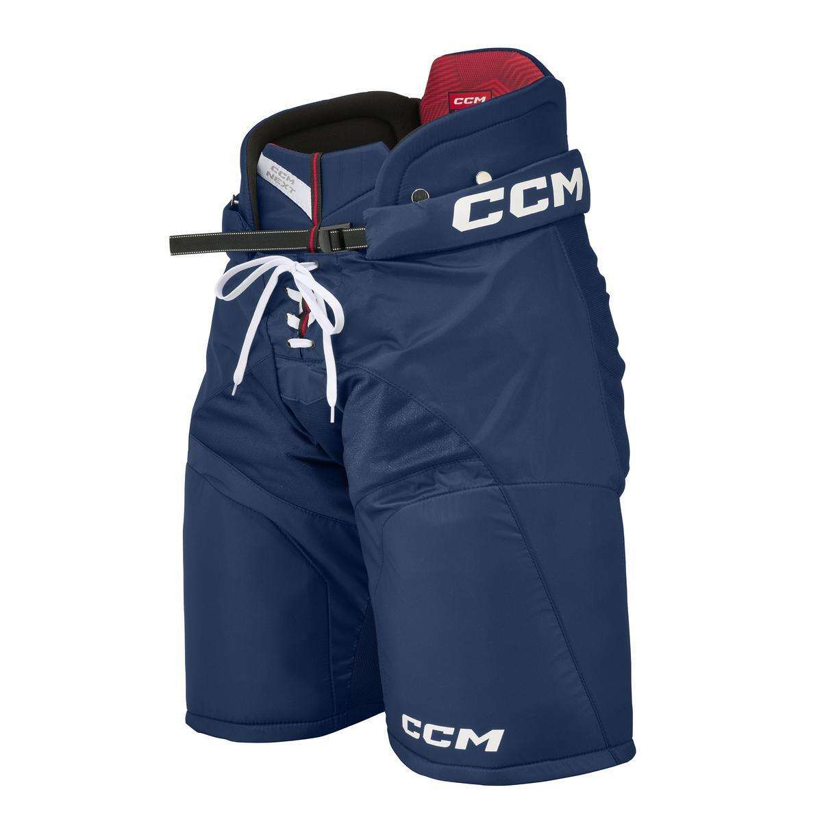 CCM Hokejové kalhoty CCM Next JR, tmavě modrá, Junior, S