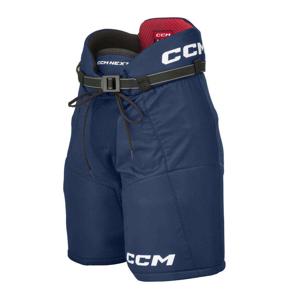 CCM Hokejové kalhoty CCM Next YTH, tmavě modrá, Dětská, S