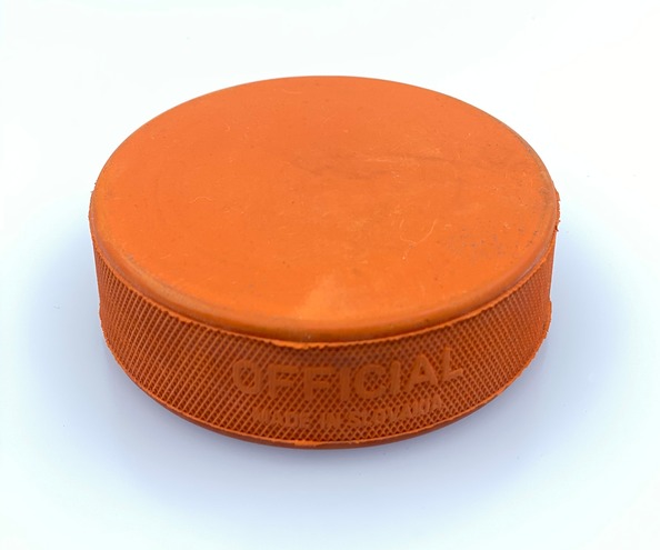 Hokejový puk oranžový ťažký tréningový